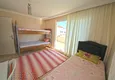 Dostępny zakup Dwupoziomowy penthouse w Mahmutlarze z umeblowaną oddzielną kuchnią i widokiem na morze 11 