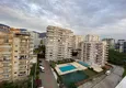 Dostępny zakup Dwupoziomowy penthouse w Mahmutlarze z meblami w zadbanym kompleksie 21