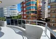 Dostępny zakup Trzypokojowe mieszkanie w Mahmutlarze z widokiem na góry - nieruchomość do odsprzedaży w Alanyi 12