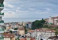 Dostępny zakup Apartament w dzielnicy Cikcilli z częściowym widokiem na morze i góry 14 
