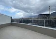 Dostępny zakup Umeblowany dwupoziomowy penthouse w Mahmutlar z widokiem na góry, morze i historyczną fortecę 15