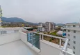Dostępny zakup Dwupoziomowy penthouse w Mahmutlarze z widokiem na morze i góry 22