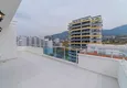 Dostępny zakup Dwupoziomowy penthouse w Mahmutlarze z widokiem na morze i góry 24