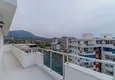 Dostępny zakup Dwupoziomowy penthouse w Mahmutlarze z widokiem na morze i góry 28