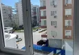 Dostępny zakup Trzypokojowe mieszkanie w Mahmutlarze z widokiem na góry - nieruchomość do odsprzedaży w Alanyi 4