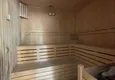 Kupić Umeblowane mieszkanie w dzielnicy Kestel z przeszklonym balkonem i widokiem na góry 9 