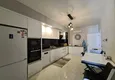 Dostępny zakup Umeblowany apartament w miejscowości Mahmutlar z oddzielną kuchnią i przeszklonym balkonem 10 