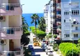Dostępny zakup Dwupokojowe mieszkanie w Mahmutlar z meblami — drugi apartament przy plaży w przystępnej cenie 18 