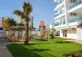 Kupić 1+1 mieszkanie do wynajęcia z dostępem do ogrodu w kurorcie Alanya - Avsallar 5 