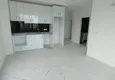 Dostępny zakup Apartament 1+1 w Avsallar z pięknym wykończeniem w nowym budynku. Nadaje się do wynajmu krótkoterminowego 3