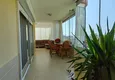 Dostępny zakup Panoramiczny apartament z dwiema sypialniami i meblami, przeszklony balkon w Mahmutlar 11 