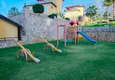 Kupić Panoramiczny apartament z dwiema sypialniami i meblami, przeszklony balkon w Mahmutlar 12 