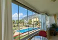 Dostępny zakup Panoramiczny apartament z dwiema sypialniami i meblami, przeszklony balkon w Mahmutlar 12 