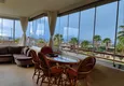 Dostępny zakup Panoramiczny apartament z dwiema sypialniami i meblami, przeszklony balkon w Mahmutlar 13 