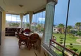Dostępny zakup Panoramiczny apartament z dwiema sypialniami i meblami, przeszklony balkon w Mahmutlar 16 