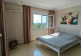 Dostępny zakup Panoramiczny apartament z dwiema sypialniami i meblami, przeszklony balkon w Mahmutlar 19 