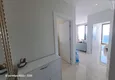 Dostępny zakup Umeblowany apartament 2+1 z widokiem na morze przy plaży, dzielnica Mahmutlar — Alanya 1
