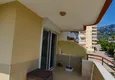 Dostępny zakup Panoramiczny apartament z dwiema sypialniami i meblami, przeszklony balkon w Mahmutlar 22 