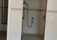 Kupić Panoramiczny apartament z dwiema sypialniami i meblami, przeszklony balkon w Mahmutlar 26 