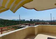 Dostępny zakup Panoramiczny apartament z dwiema sypialniami i meblami, przeszklony balkon w Mahmutlar 23 
