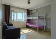 Dostępny zakup Panoramiczny apartament z dwiema sypialniami i meblami, przeszklony balkon w Mahmutlar 31 