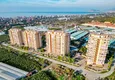 Kupić Panoramiczny apartament z dwiema sypialniami i meblami, przeszklony balkon w Mahmutlar 4 
