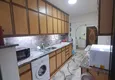 Dostępny zakup Квартира 2+1 в центре Алании с мебелью, отдельной кухней и застекленным балконом 4