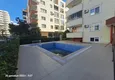 Kupić Dwupokojowy apartament z meblami, widokiem na morze i góry 250 metrów od wybrzeża — dzielnica Mahmutlar 4