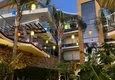 Kupić Apartament z wyjściem do ogrodu w rezydencji z koncepcją hotelową — Alanya, dzielnica Konakli 14