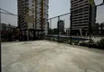 Kupić Apartament z jedną sypialnią z pięknym wykończeniem i widokiem na góry w dzielnicy Tomyuk, Mersin. Rata jest możliwa 17