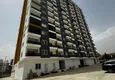 Kupić Apartament z jedną sypialnią z pięknym wykończeniem i widokiem na góry w dzielnicy Tomyuk, Mersin. Rata jest możliwa 18