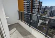 Dostępny zakup Apartament z jedną sypialnią z pięknym wykończeniem i widokiem na góry w dzielnicy Tomyuk, Mersin. Rata jest możliwa 16