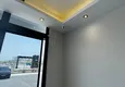 Kupić Apartament z jedną sypialnią z pięknym wykończeniem i widokiem na góry w dzielnicy Tomyuk, Mersin. Rata jest możliwa 24