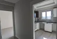 Dostępny zakup Apartament z jedną sypialnią z pięknym wykończeniem i widokiem na góry w dzielnicy Tomyuk, Mersin. Rata jest możliwa 3
