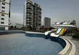Kupić Apartament z jedną sypialnią z pięknym wykończeniem i widokiem na góry w dzielnicy Tomyuk, Mersin. Rata jest możliwa 6