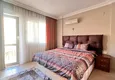 Dostępny zakup Przytulny apartament z 2 sypialniami z meblami i widokiem na góry w sercu Alanyi 4