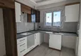 Dostępny zakup Apartament z jedną sypialnią z pięknym wykończeniem i widokiem na góry w dzielnicy Tomyuk, Mersin. Rata jest możliwa 4