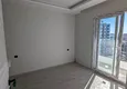 Dostępny zakup Apartament z jedną sypialnią z pięknym wykończeniem i widokiem na góry w dzielnicy Tomyuk, Mersin. Rata jest możliwa 7