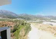 Dostępny zakup Oferta inwestorska: Apartament z jedną sypialnią i widokiem na góry w kompleksie premium — Alanya, Mahmutlar 9