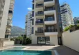 Kupić Apartament z jedną sypialnią pod klucz z widokiem na góry w nowoczesnym kompleksie mieszkalnym — Alanya, dzielnica Mahmutlar 2 