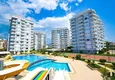 Kupić Apartament liniowy 3+1 z meblami, widokiem na morze i góry na plaży - Tosmur, Alanya 1