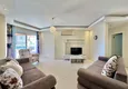 Dostępny zakup Apartament 1+1 z meblami i widokiem na morze, odpowiedni na zezwolenie na pobyt - Alanya, dzielnica Tosmur 1