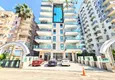 Kupić Nieruchomość na zezwolenie na pobyt! Dwupoziomowy penthouse z widokiem na morze i góry - dzielnica Mahmutlar, Alanya 1 