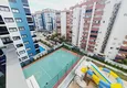 Dostępny zakup Jednopokojowe mieszkanie od właściciela w nowym budynku - dzielnica Mahmutlar, Alanya 13 