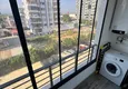 Dostępny zakup Dwupokojowe mieszkanie z meblami i przeszklonym balkonem w Mersin - Tomyuk 19 
