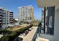Dostępny zakup Dwupokojowe mieszkanie z meblami i przeszklonym balkonem w Mersin - Tomyuk 21 