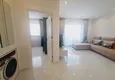 Dostępny zakup Apartament 1+1 z meblami i widokiem na góry w kompleksie z infrastrukturą hotelową, dzielnica Mahmutlar — Alanya  1 