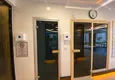 Kupić Umeblowane mieszkanie w Mahmutlar z przeszklonym balkonem w kompleksie premium 20 