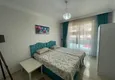 Dostępny zakup Apartament z dwiema sypialniami z meblami i widokiem na góry w Mahmutlar - zaledwie 300 metrów od morza 9 