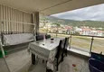 Dostępny zakup Apartament w centrum Alanyi z oddzielnymi meblami kuchennymi i widokiem na góry  9 